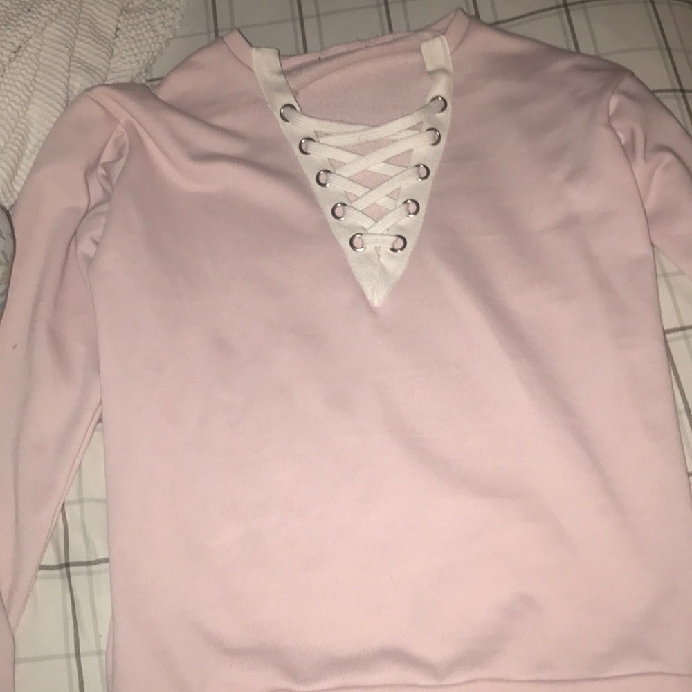Pink cross sweater